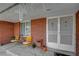 Welcoming front porch with seating and charming details at 3140 Unicorn Ave, Pahrump, NV 89048