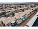 Aerial view showcasing a pool, patio, and backyard oasis in a gated community at 3320 Helmsman Dr, North Las Vegas, NV 89032