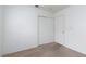 Bedroom features neutral carpet, closet, and neutral paint ready for customization at 3320 Helmsman Dr, North Las Vegas, NV 89032