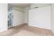Neutral carpeted bedroom with plenty of natural light at 3320 Helmsman Dr, North Las Vegas, NV 89032