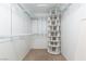 Walk-in closet with custom shelving and ample storage space at 3320 Helmsman Dr, North Las Vegas, NV 89032