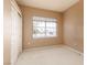 Bedroom offers a window view and closet at 3514 Shonna Way, North Las Vegas, NV 89032