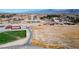 Establishing neighborhood view of new development under construction with view to mountains at 3600 E Bridger St, Pahrump, NV 89061