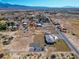 This desert property features a large home and ample land with plenty of space for recreational opportunities at 3600 E Bridger St, Pahrump, NV 89061