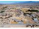 Extensive aerial view of homesite with new construction and established neighborhood at 3600 E Bridger St, Pahrump, NV 89061