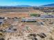 This aerial view captures the estate-sized property with recreation areas and panoramic desert views at 3600 E Bridger St, Pahrump, NV 89061