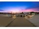 Backyard featuring desert landscaping with inviting lounge area at 3600 E Bridger St, Pahrump, NV 89061