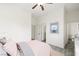 Bright bedroom features calming decor and an ensuite bathroom at 3600 E Bridger St, Pahrump, NV 89061