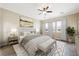 Serene bedroom with neutral tones, a plush bed, and large windows that provide natural light at 3600 E Bridger St, Pahrump, NV 89061
