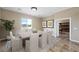 Dining room featuring a large window, table and chairs at 3600 E Bridger St, Pahrump, NV 89061