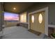 Charming covered front porch featuring a decorative double door entrance and stylish accents at 3600 E Bridger St, Pahrump, NV 89061