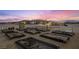 Desert home features raised garden beds, ideal for gardening enthusiasts at 3600 E Bridger St, Pahrump, NV 89061