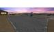 Home playground shows slide, swing set, climbing structure and bordered pit at 3600 E Bridger St, Pahrump, NV 89061