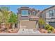 Charming two-story home with a two-car garage and well-maintained landscaping at 3958 Blushing Hearts Rd, Las Vegas, NV 89115