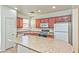 Functional kitchen with appliances and an island, ideal for meal prep and casual dining at 3958 Blushing Hearts Rd, Las Vegas, NV 89115