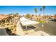 Exterior view of neighborhood featuring carports, parking, mature landscaping, and community roadways at 4083 Nook Way # D, Las Vegas, NV 89103