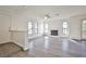 Spacious living room featuring a ceiling fan and a stunning fireplace at 4083 Nook Way # D, Las Vegas, NV 89103