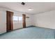 Bedroom features a window with brown curtains and a ceiling vent at 4155 Comb Cir, Las Vegas, NV 89104