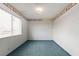 Empty bedroom with a window and light coming in through the blinds at 4155 Comb Cir, Las Vegas, NV 89104