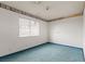 Bedroom with a window and blue carpet at 4155 Comb Cir, Las Vegas, NV 89104