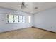 Bedroom with a large window covered with insulation board at 4155 Comb Cir, Las Vegas, NV 89104