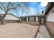 Charming single-story home with brick accents and a walkway to the front door at 4155 Comb Cir, Las Vegas, NV 89104