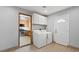 Bright laundry room featuring modern washer and dryer units at 4155 Comb Cir, Las Vegas, NV 89104