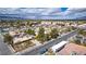 Aerial view of a home featuring a large yard with an outbuilding and convenient street access at 4300 Thom Blvd, Las Vegas, NV 89130