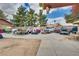 A spacious backyard has multiple vehicles and equipment, may need organization and tidy up at 4300 Thom Blvd, Las Vegas, NV 89130