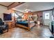Bedroom featuring decorative wood furniture, tile flooring, ceiling fan, and vintage decor at 4300 Thom Blvd, Las Vegas, NV 89130
