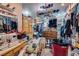Walk-in closet with hanging clothes, boxes, furniture, and unique ceiling decor at 4300 Thom Blvd, Las Vegas, NV 89130