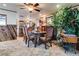 Dining room featuring a classic table and chairs, tile floors, and vintage decor at 4300 Thom Blvd, Las Vegas, NV 89130
