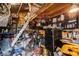 An untidy garage is filled with stored items and tools; may need some organizing and cleanout at 4300 Thom Blvd, Las Vegas, NV 89130