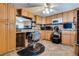 Kitchen with custom cabinetry, vanity area, and salon chair at 4300 Thom Blvd, Las Vegas, NV 89130