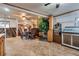 Open concept living room with tile floors, exposed wood beam, and classic decor at 4300 Thom Blvd, Las Vegas, NV 89130