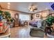 Cozy living room with tile floors, neutral walls and a ceiling fan at 4300 Thom Blvd, Las Vegas, NV 89130