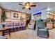A spacious living room with comfortable furniture and a view into the kitchen at 4300 Thom Blvd, Las Vegas, NV 89130