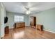 Bedroom featuring hardwood floors, ceiling fan, and natural light at 4431 Palm Mesa Dr, Las Vegas, NV 89120