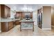 Updated kitchen featuring stainless steel appliances, granite countertops, and a stylish island at 4431 Palm Mesa Dr, Las Vegas, NV 89120