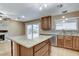 Open kitchen featuring granite counters, stainless steel appliances, and a center island with bar seating at 4431 Palm Mesa Dr, Las Vegas, NV 89120