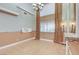 Bright open-concept living room featuring high ceilings and tile floors at 4431 Palm Mesa Dr, Las Vegas, NV 89120