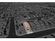 A beautiful aerial view highlights the neighborhood's houses with their yards at 4588 Swimming Minnow Ave, Las Vegas, NV 89141