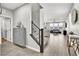 View of the entryway showcasing a staircase and an open layout leading to the living areas at 4588 Swimming Minnow Ave, Las Vegas, NV 89141