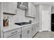 Well-lit kitchen features stainless steel appliances, modern cabinetry, and sleek countertops at 4588 Swimming Minnow Ave, Las Vegas, NV 89141