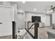 An upstairs living room with a couch and a television at the top of the stairs at 4588 Swimming Minnow Ave, Las Vegas, NV 89141