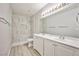 Updated bathroom with walk-in shower, updated vanity with lots of counter space and a large mirror at 5121 Pioneer Ave # 204, Las Vegas, NV 89146