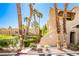 Exterior view of home featuring desert landscaping and palm trees at 5121 Pioneer Ave # 204, Las Vegas, NV 89146