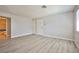 Living room with light-colored walls and light-colored wood grain flooring at 5121 Pioneer Ave # 204, Las Vegas, NV 89146