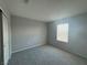 Spacious bedroom with a carpeted floor, neutral paint, and a closet with sliding doors at 5180 Hisopo St # Lot 24, Las Vegas, NV 89122