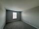 Unfurnished bedroom with light gray walls, window, and carpet ready for personalization at 5180 Hisopo St # Lot 24, Las Vegas, NV 89122